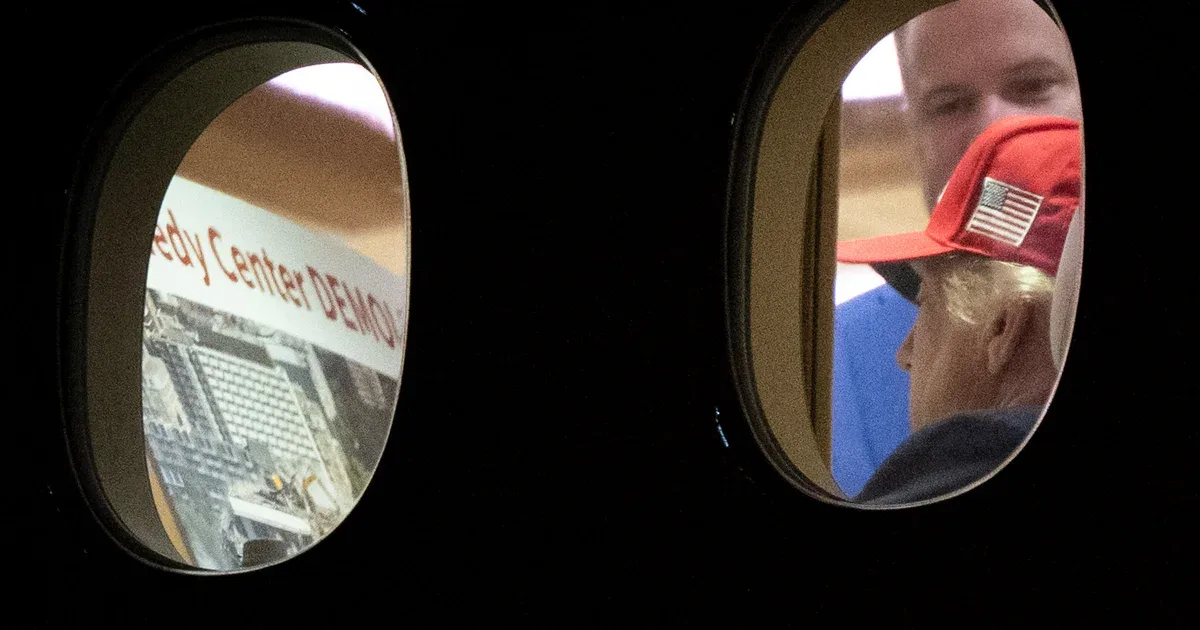 Trump photo shows him viewing "Kennedy Center demolished" document