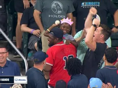 WATCH:  Birthday girl shows off her arm after catching home run at Braves game